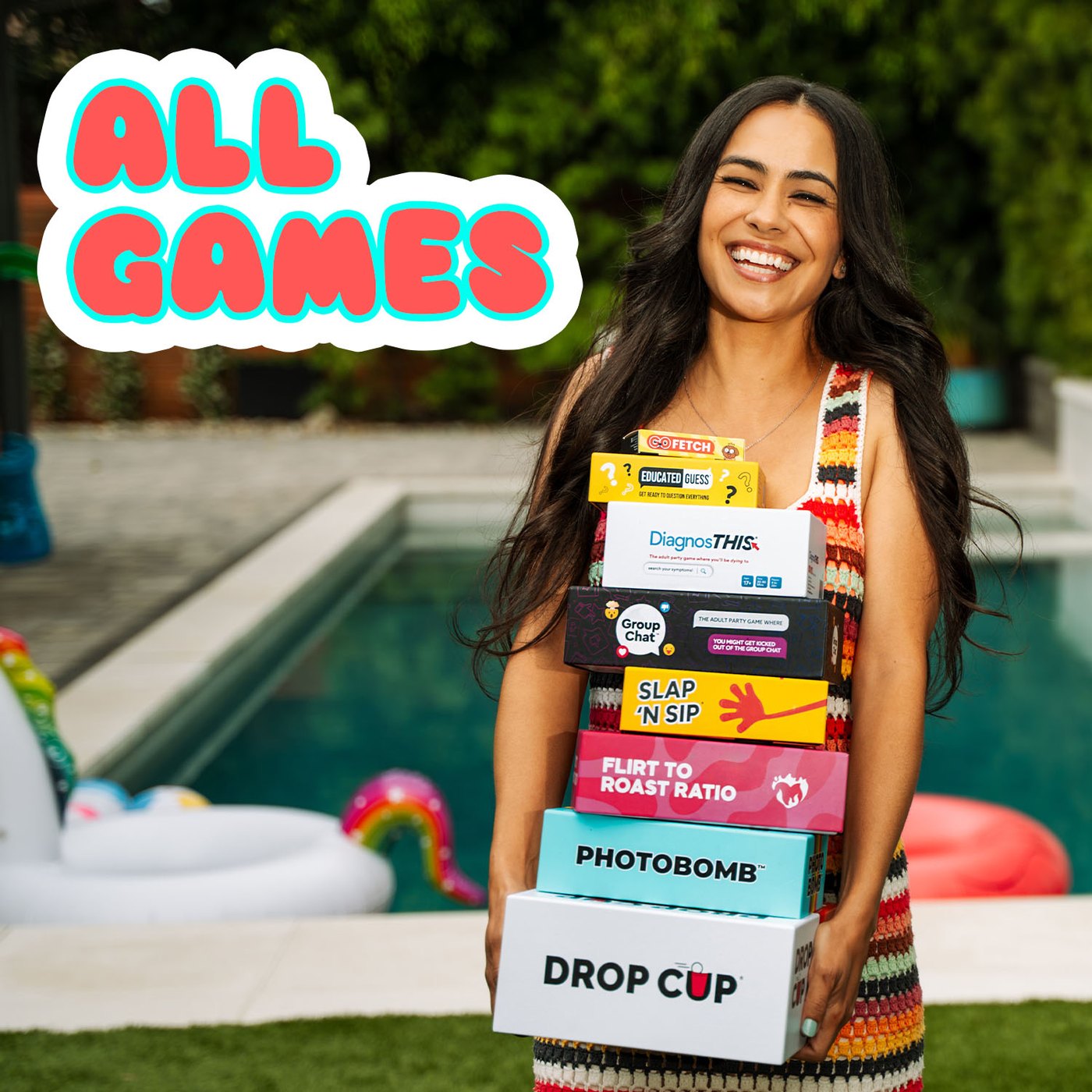 An armful of Thrilly party game boxes